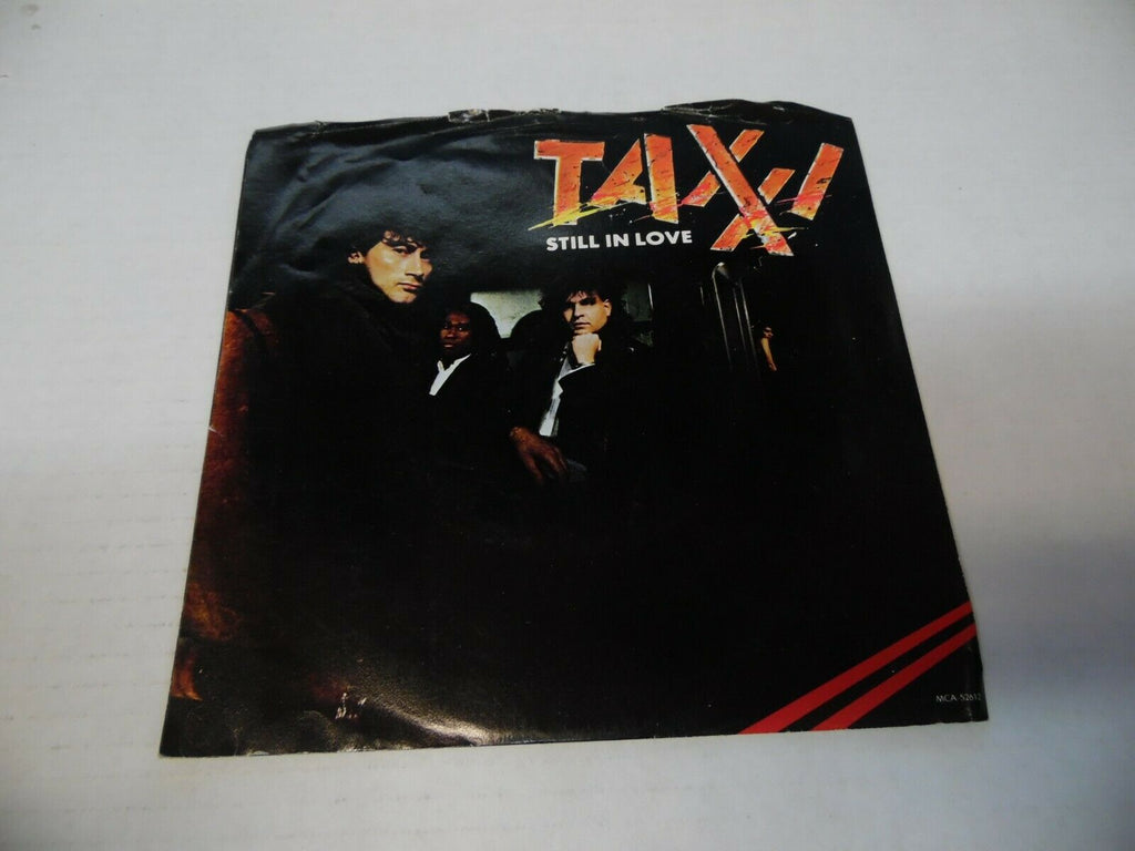 Taxxi Guessing Games & Still in love with picture sleeve 45 rpm 022920LLE45